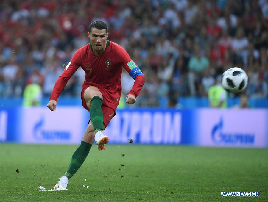 Portugal\'s Cristiano Ronaldo scores a free kick during a group B match between Portugal and Spain at the 2018 FIFA World Cup in Sochi, Russia, June 15, 2018. The match ended in a 3-3 draw. (Xinhua/Li Ga)
Best performance
Cristiano Ronaldo again showed his ability to deliver when it matters most by single-handedly keeping Portugal in the game in their opener against Spain. Ultimately his three goals - including a dipping late free-kick - were not enough to hand his team victory over the 2010 champions.