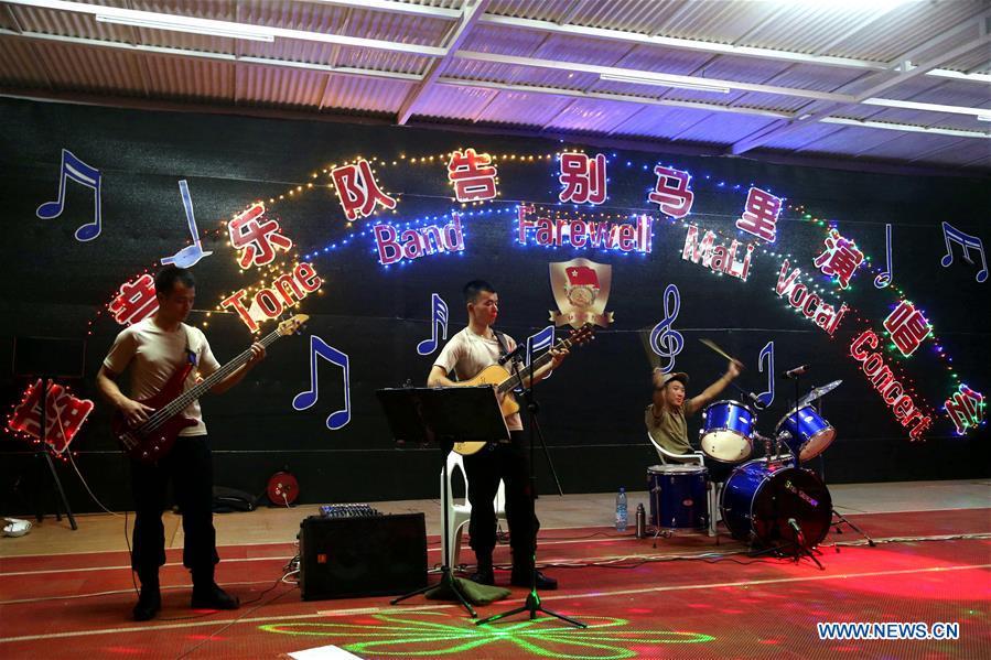 Blue Tone band of Chinese peacekeepers perform during their farewell concert at the Chinese camp of the UN Multidimensional Integrated Stabilization Mission in Mali, May 12, 2018. In late 2013, China, for the first time, dispatched a security force of 170 soldiers to the UN Multidimensional Integrated Stabilization Mission in Mali (MINUSMA). Among the fifth batch of Chinese peacekeepers of MUNISMA, six soldiers established Blue Tone band in their spare time. On May 12, 2018, the Blue Tone band held a farewell concert before its members returned to China. This year marks the 70th anniversary of UN peacekeeping. China began its participations in the UN peacekeeping operations in 1990. Today, China has some 2,500 peacekeepers and plays an important role in promoting and maintaining world peace. (Xinhua/Han Lijian)