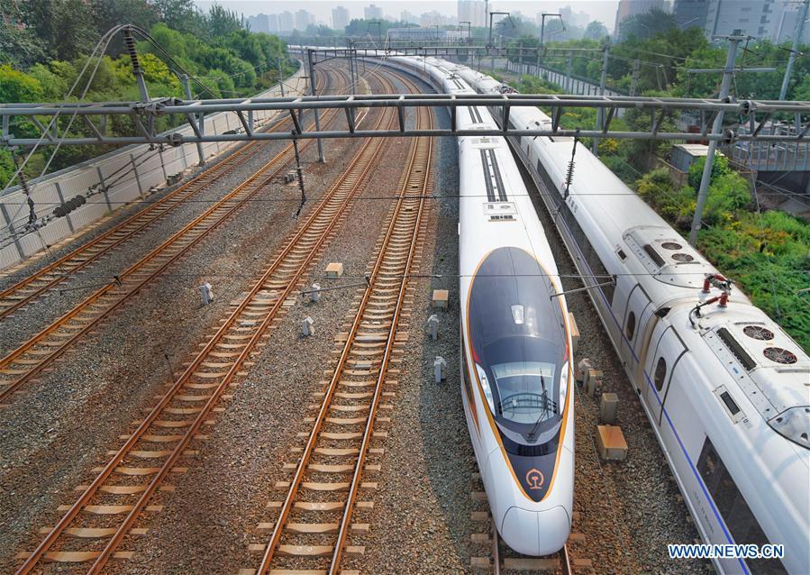 The G7 Fuxing bullet train departs the Beijing South Railway Station in Beijing, capital of China, July 1, 2018. The new longer Fuxing bullet train ran on the Beijing-Shanghai line for the first time on Sunday. With a designed speed of 350 kilometers per hour, the new train measures more than 400 meters in length and has 16 carriages, twice as many as current ones. It can carry nearly 1,200 passengers. (Xinhua/Xing Guangli)