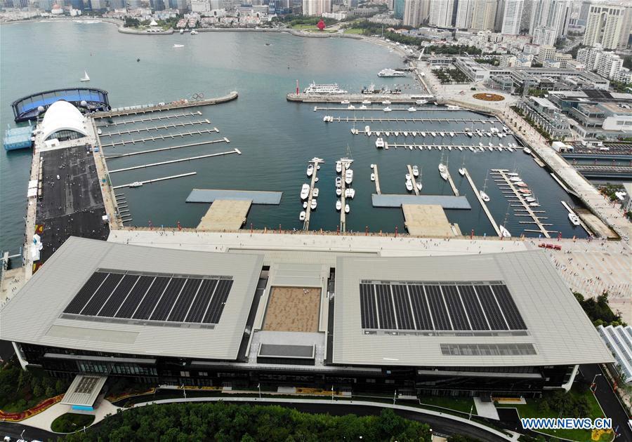 Aerial photo taken on July 1, 2018 shows the Olympic sailing center in Qingdao of east China\'s Shandong Province. The center, used as the conference hall during the 18th Shanghai Cooperation Organization (SCO) summit, after a brief remodification, was opened to the public from this Sunday. (Xinhua/Li Ziheng)