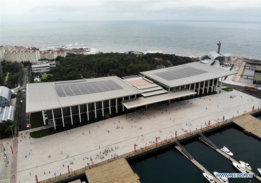 Aerial photo taken on July 1, 2018 shows the Olympic sailing center in Qingdao of east China\'s Shandong Province. The center, used as the conference hall during the 18th Shanghai Cooperation Organization (SCO) summit, after a brief remodification, was opened to the public from this Sunday. (Xinhua/Li Ziheng)