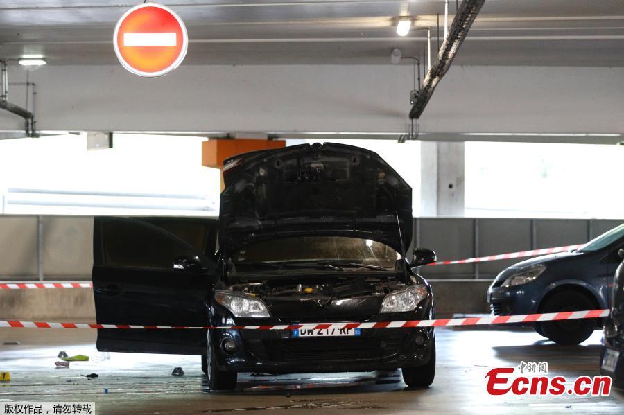 Photo taken on July 1, 2018 in Aulnay-sous-Bois, north of Paris shows a car abandoned by French robber Redoine Faid at O\'Parinor shopping mall parking after his escape onboard a helicopter from a prison in Reau. Redoine Faid was flown out of Réau prison with the help of three heavily-armed accomplices, security sources say. (Photo/Agencies)
