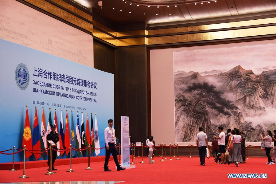 Visitors take a tour inside the Olympic sailing center in Qingdao of east China\'s Shandong Province, July 1, 2018. The center, used as the conference hall during the 18th Shanghai Cooperation Organization (SCO) summit, after a brief remodification, was opened to the public from this Sunday. (Xinhua/Li Ziheng)