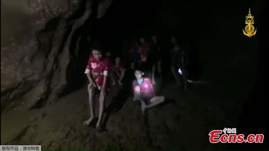 This video grab taken from footage released by The Royal Thai Navy late July 2, 2018, shows missing children inside the Tham Luang cave of Khun Nam Nang Non Forest Park in the Mae Sai district of Chiang Rai province. Twelve boys and their football coach trapped in a flooded Thai cave for ten days were found alive after a painstaking search by specialist divers who finally discovered the emaciated group on a mud embankment.(Photo/Agencies)