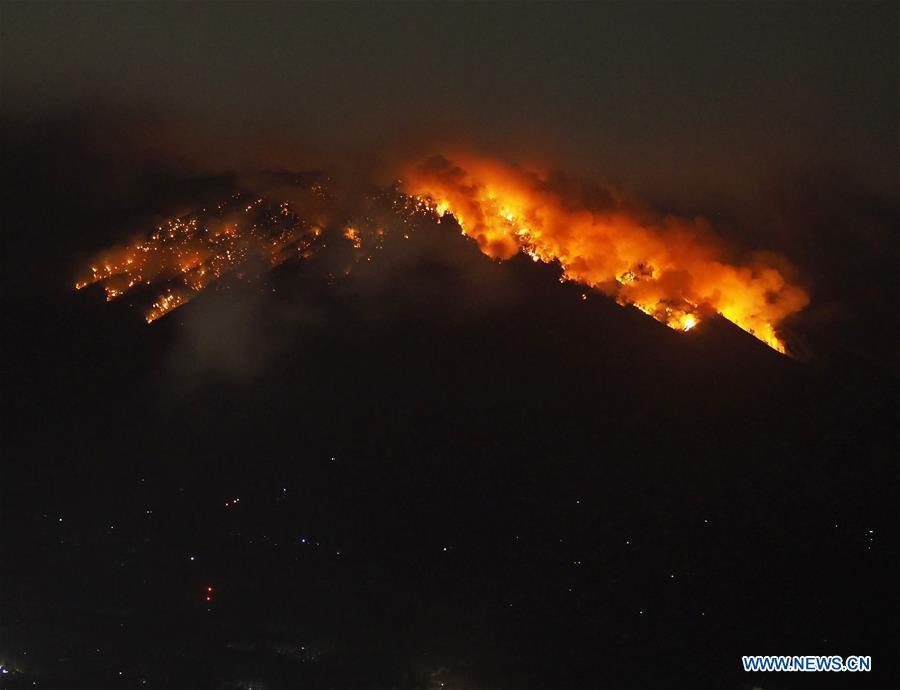 Mount Agung volcano erupts at Lempuyangan Village in Karangasem, Bali of Indonesia, July 2, 2018. The Mount Agung volcano erupted on Monday evening, hurling lava down its slopes.(Xinhua/Monstar Simanjuntak)