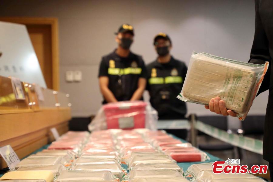 Hong Kong Customs show seized drugs, July 1, 2018. On June 30, Hong Kong Customs seized approximately 79 kilograms of suspected cocaine and one kilogram of suspected methamphetamine with an estimated market value of approximately $80 million in Tuen Mun. It is potentially the largest cocaine seize by Hong Kong Customs in five years. A 52-year-old Hong Kong man was arrested during the morning raid following a week-long operation. (Photo: China News Service/Hong Shaokui)