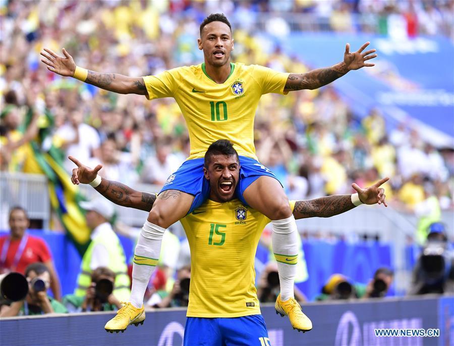Neymar (top) of Brazil celebrates scoring with Paulinho during the 2018 FIFA World Cup round of 16 match between Brazil and Mexico in Samara, Russia, July 2, 2018. (Xinhua/Chen Yichen)