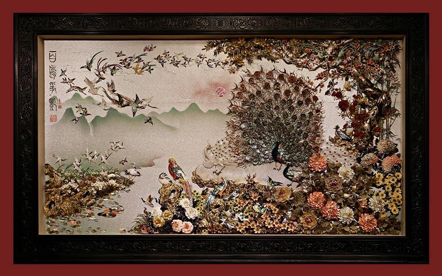 These outstanding shell carving works were made by Jin Ashan in Dalian, Northeast China\'s Liaoning Province. Jin has been engaged in shell carving for 55 years. He is a master of Chinese arts and crafts. (Photo/China Daily)