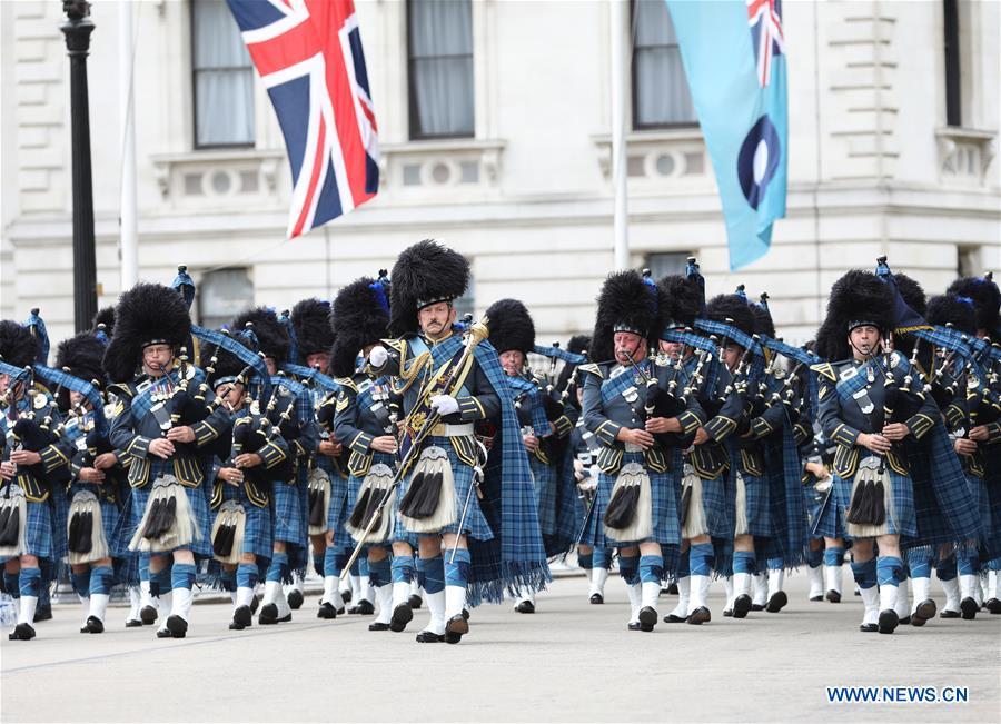 The Royal Air Force (RAF) Pipes and Drums band take part in a parade to mark the 100th anniversary of RAF in London, Britain on July 10, 2018. (Xinhua/Britain\'s Ministry of Defence)