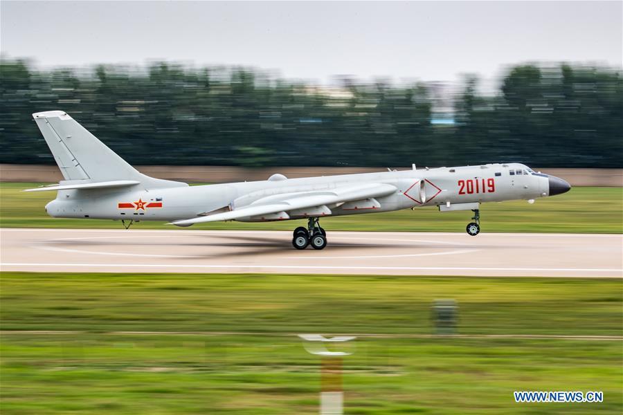 A PLA air force H-6K bomber is seen during a training module in preparation for the International Army Games on July 12, 2018. The Chinese People\'s Liberation Army (PLA) air force will send H-6K bombers, J-10A fighters, JH-7A fighter-bombers, IL-76 and Y-9 transport aircrafts, and a team of airborne troops to Russia to participate in the International Army Games 2018. It will be the first time that H-6K bombers and Y-9 transport aircraft have gone abroad to take part in military competitions.(Xinhua/Yang Pan)