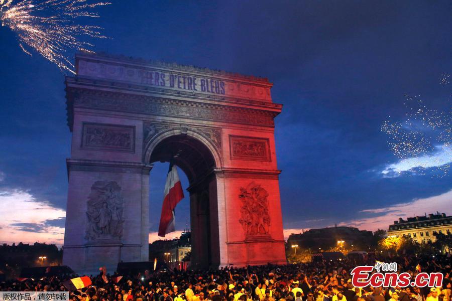 France fans celebrate on the Champs-Elysees avenue after France win the World Cup final, July 15, 2018. (Photo/Agencies)