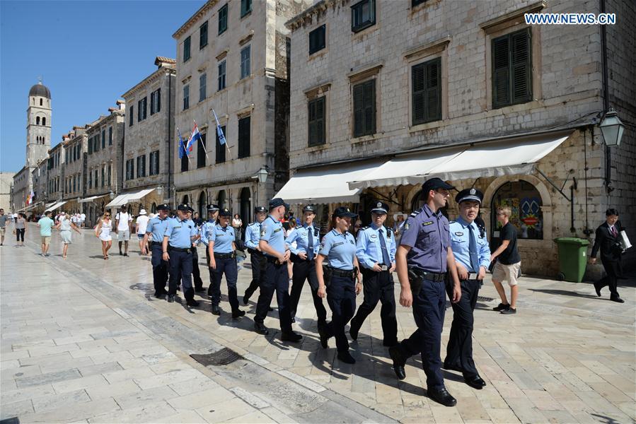Chinese and Croatian police officers patrol after the launching ceremony of joint police patrol between China and Croatia in the Old Town of Dubrovnik, Croatia, on July 15, 2018. Six uniformed Chinese police officers started joint patrol with their Croatian counterparts here on Sunday. (Xinhua/Gao Lei)