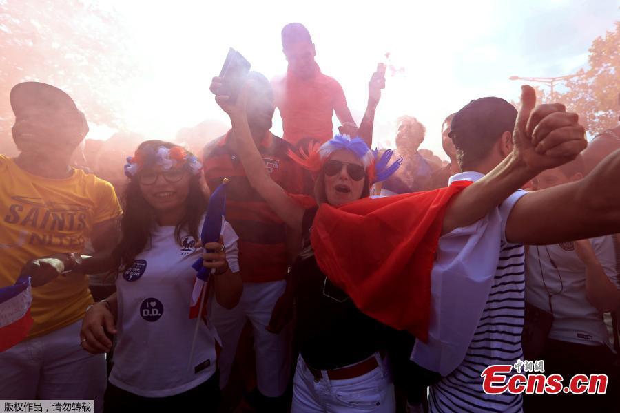 France fans celebrate on the Champs-Elysees avenue after France win the World Cup final, July 15, 2018. (Photo/Agencies)