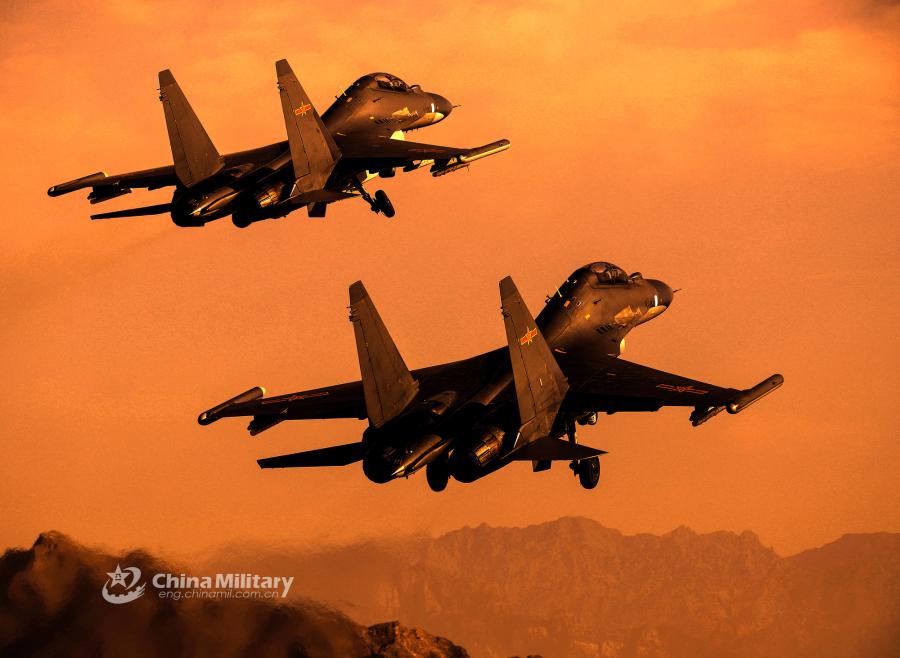 Two fighter jets take off for a combat sortie during the \