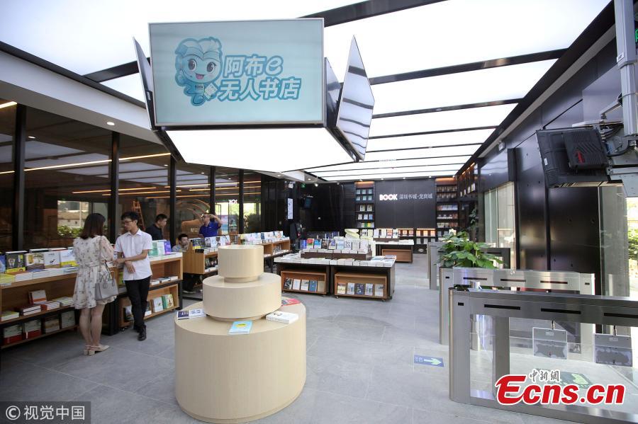 A smart, unmanned bookstore opens in Shenzhen City, South China’s Guangdong Province, July 18, 2018. The 178-sqm bookstore, the largest unmanned bookstore in China, allows customers to process their payments using facial recognition technology. After scanning a code to enter the bookstore, customers can find the precise location of a book and complete payment through Tencent’s popular social networking app WeChat. (Photo/VCG)