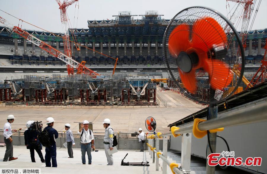 Electrical fans are seen during a heat wave, at the construction site of the New National Stadium, the main stadium of the Tokyo 2020 Olympics and Paralympics, during a media opportunity in Tokyo, Japan, July 18, 2018. As the two-year mark approaches for the Tokyo 2020 Olympics, Japan is being scorched by an intense heatwave that has prompted fears of similar extreme weather when the sporting showpiece takes place in the country. (Photo/Agencies)