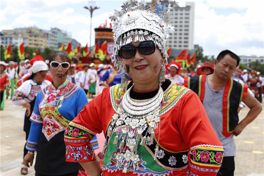 People celebrate black face festival in Qiubei county, Yunnan Province. (Photo/chinadaily.com.cn)