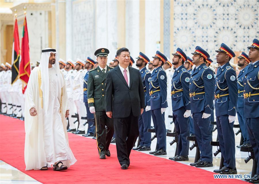 Chinese President Xi Jinping, accompanied by Crown Prince of Abu Dhabi Sheikh Mohammed bin Zayed Al Nahyan, reviews the guard of honor during a grand welcome ceremony in Abu Dhabi, the United Arab Emirates (UAE), July 20, 2018. Xi arrived here on Thursday for a state visit to the UAE. (Xinhua/Li Xueren)