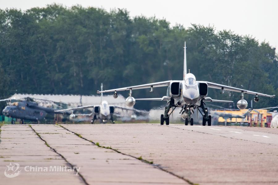 A JH-7A fighter bomber attached to the Chinese PLA Air Force taxies on runway after landing at the airport on July 20. All aircraft of the PLA Air Force to participate in the \