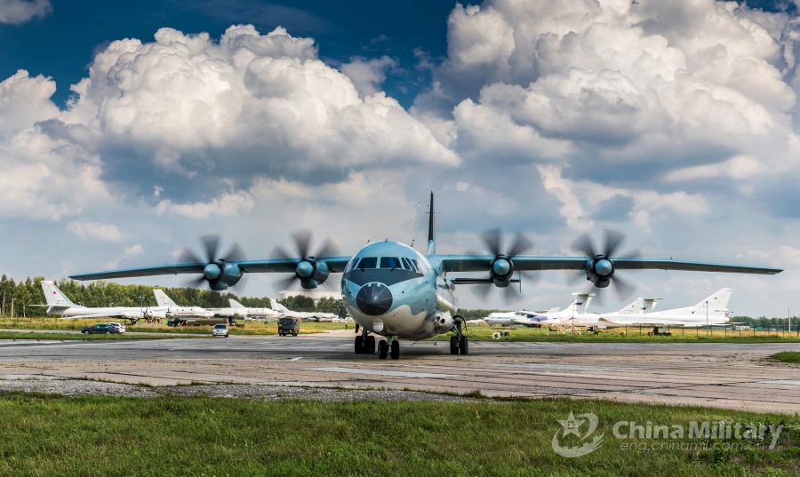 A Y-9 transport aircraft taxies on the runway after landing at the airport on July 20. All aircraft of the PLA Air Force to participate in the \
