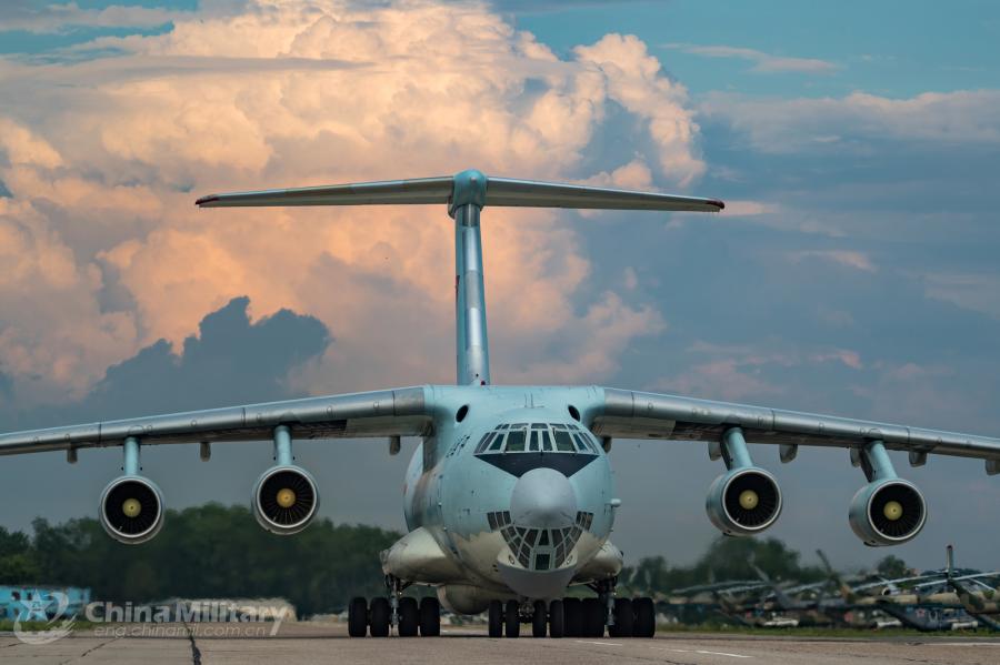 An IL-76 transport aircraft taxies on the runway. A All aircraft of the PLA Air Force to participate in the \