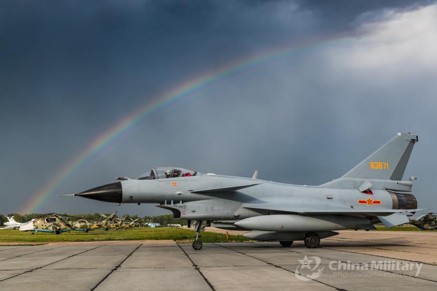 A J-10A fighter jet attached to the Chinese PLA Air Force taxies on runway after landing at the airport on July 21. All aircraft of the PLA Air Force to participate in the \