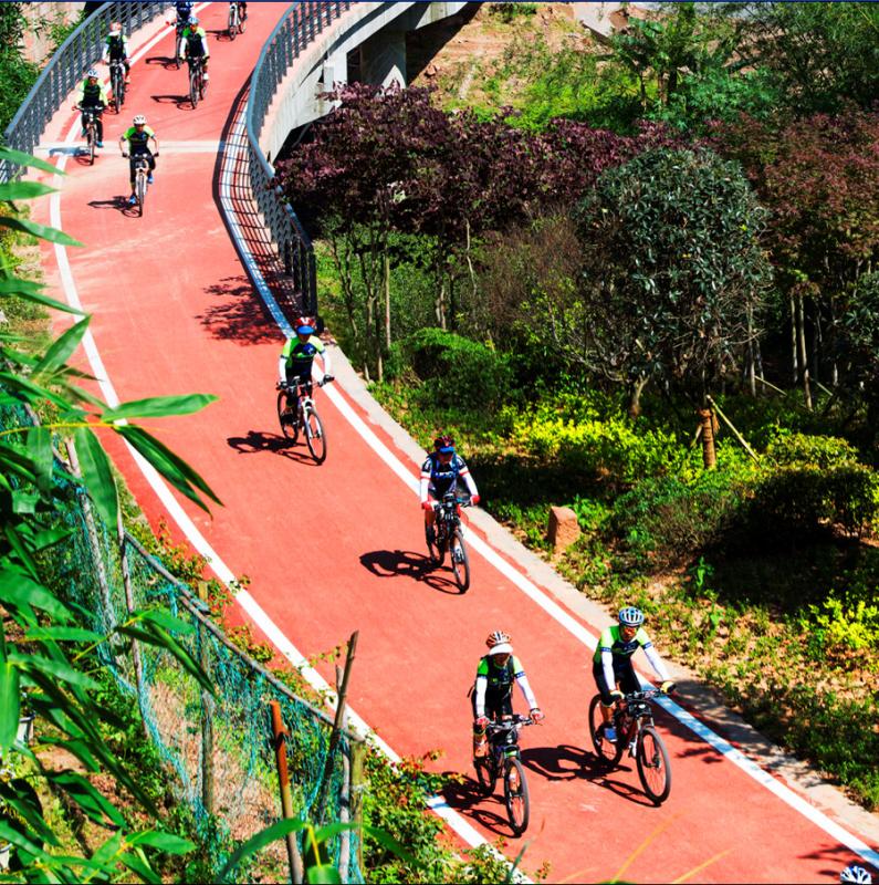 Chishui Valley tourism highway located in Southwest China\'s Guizhou Province is the first tourism highway in China. Here at the beautiful highway, visitors can drive along the Chishui river and watch the rugged red landscape of Mount Danxia. (Photo/chinadaily.com.cn)