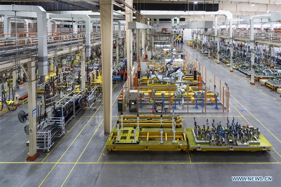 Photo taken on May 8, 2018 shows a weld plant at a research and development center of Geely Auto in east China\'s Zhejiang Province. This year marks the 40th anniversary of China\'s reform and opening-up policy. (Xinhua)
