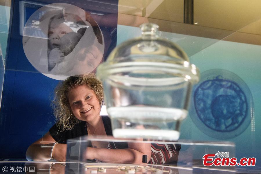 Louise Brown looks towards a dessicator at the Science Museum on July 23, 2018 in London, England. On 25th July 1978, Louise Brown became the first baby to be born using the In Vitro Fertilisation technique pioneered by British researchers Robert Edwards, Patrick Steptoe and Jean Purdy. The Science Museum in London is holding an exhibition entitled IVF: 6 Million Babies Later to celebrate the success of IVF. (Photo/VCG)