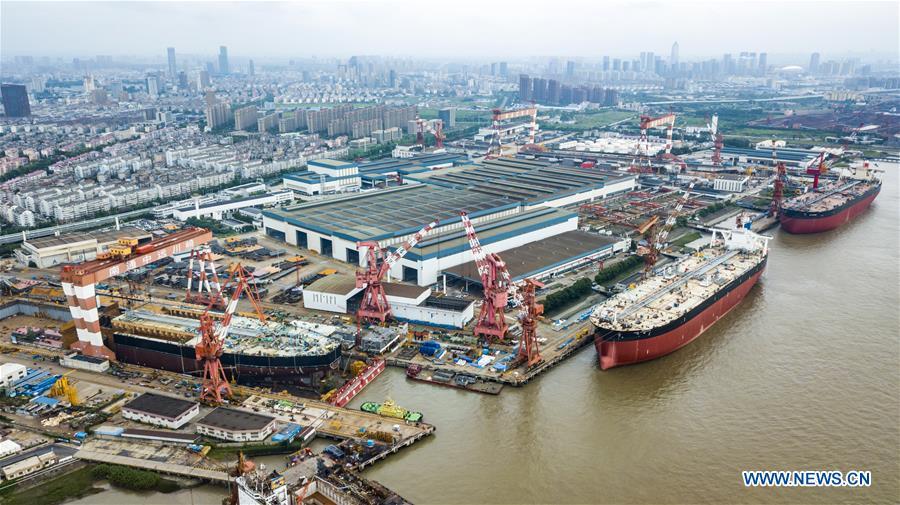 Photo taken on July 6, 2018 shows a shipyard of Nantong COSCO KHI Ship Engineering Co., Ltd. This year marks the 40th anniversary of China\'s reform and opening-up policy. (Xinhua/Shen Bohan)