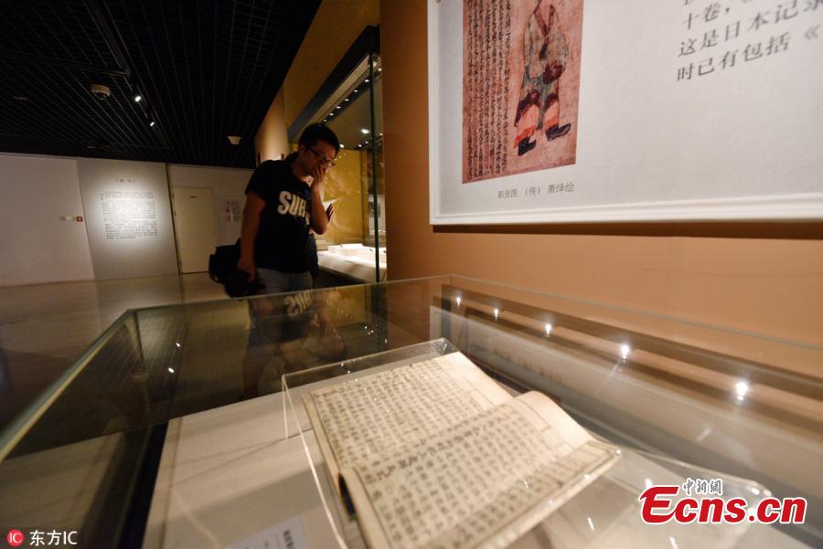 Ancient books donated by Japan\'s Eisei Bunko Museum are on display at an exhibition in National Museum of Classic Books in Beijing on July 24, 2018. To mark the 40th anniversary of the signing of the Sino-Japanese Peace and Friendship Treaty, Japan\'s Eisei Bunko Museum donated 4,175 ancient Chinese books to the National Library of China in June this year. (Photo/IC)
