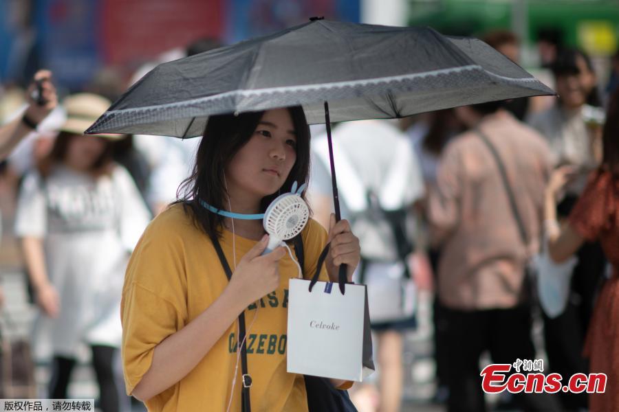 The temperature rose to a record 41.1 Celsius (106 Fahrenheit) in a city northwest of Tokyo on Monday, as a heat wave in Japan that has killed at least 23 people and sent thousands to hospital showed no sign of significant easing. (Photo/Agencies)