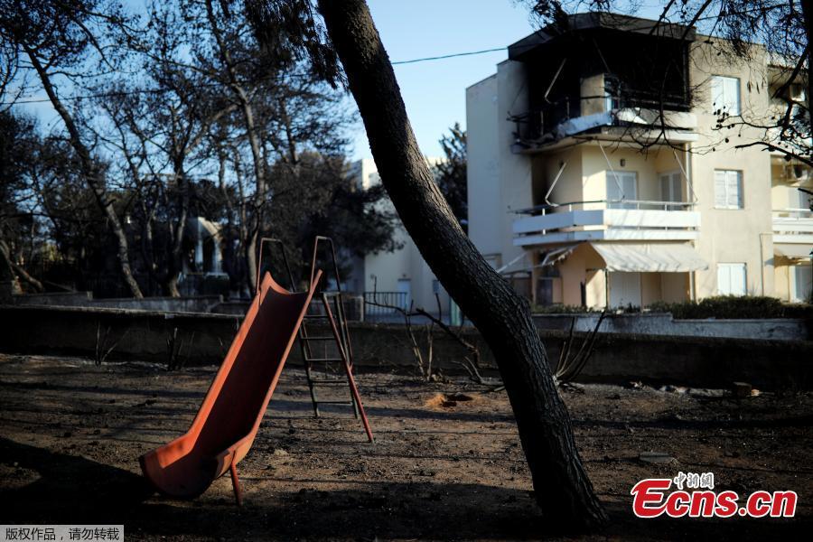 A slide is seen in a burnt playground following a wildfire at the village of Mati, near Athens, Greece, July 25, 2018. (Photo/Agencies)
