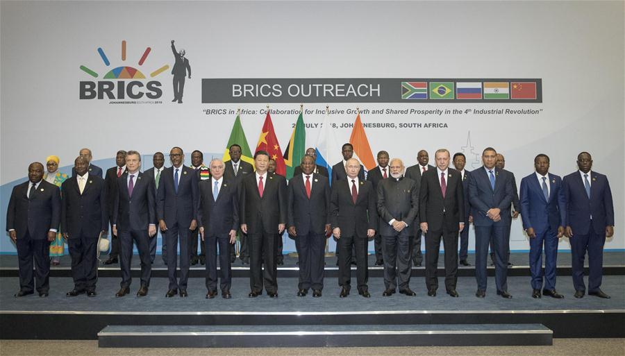 The BRICS leaders pose for a group photo with leaders or representatives of the leaders from invited countries, and heads of regional organizations in Africa in Johannesburg, South Africa, July 27, 2018. Chinese President Xi Jinping made a speech to an outreach dialogue grouping leaders from the BRICS, the \