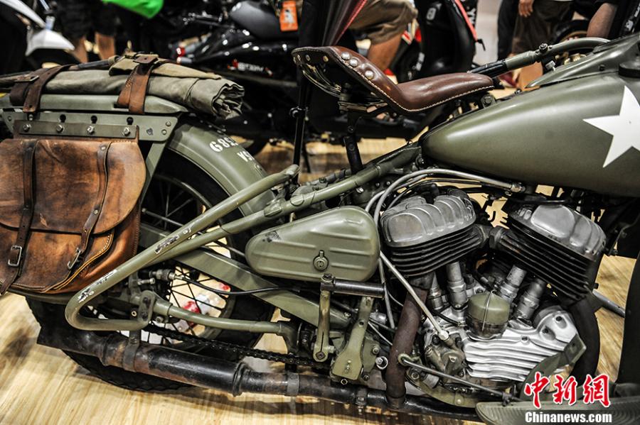 Photo taken on July 28- 29, 2018 shows a motorcycle exhibition held at the China National Convention Center in Beijing. Organized by an online auto platform, the fair displayed hundreds of motorcycles from home and abroad, such as the Ducati 959 sport bike, vintage Changjiang 650 sidecar, the Harley-Davidson WLA produced to the U.S. Army during the World War II and Benelli Leoncino bike. (Photo: China News Service/Fu Yu)