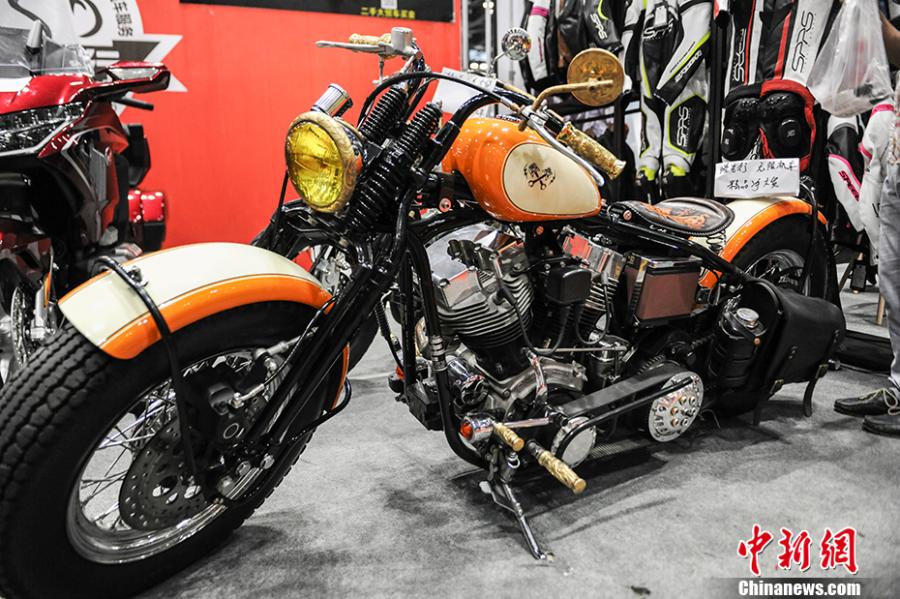 Photo taken on July 28- 29, 2018 shows a motorcycle exhibition held at the China National Convention Center in Beijing. Organized by an online auto platform, the fair displayed hundreds of motorcycles from home and abroad, such as the Ducati 959 sport bike, vintage Changjiang 650 sidecar, the Harley-Davidson WLA produced to the U.S. Army during the World War II and Benelli Leoncino bike. (Photo: China News Service/Fu Yu)