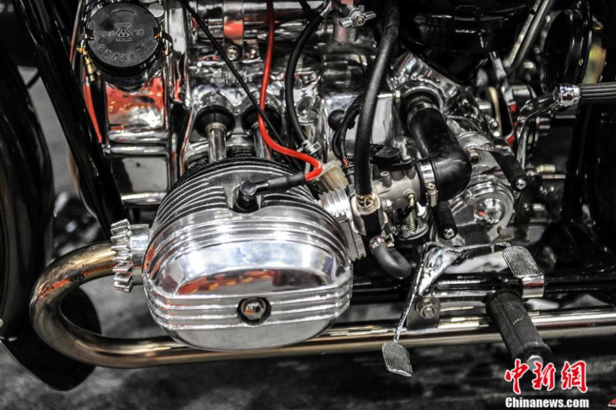 Photo taken on July 28- 29, 2018 shows a motorcycle exhibition held at the China National Convention Center in Beijing. Organized by an online auto platform, the fair displayed hundreds of motorcycles from home and abroad, such as the Ducati 959 sport bike, vintage Changjiang 650 sidecar, the Harley-Davidson WLA produced to the U.S. Army during the World War II and Benelli Leoncino bike. (Photo: China News Service/Fu Yu)