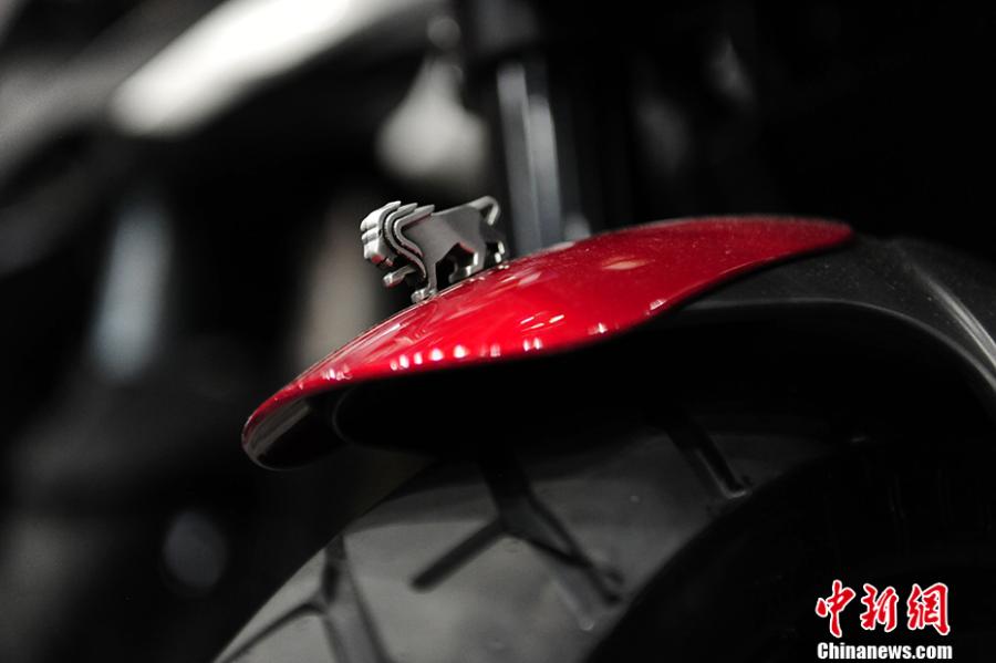 Photo taken on July 28- 29, 2018 shows a motorcycle exhibition held at the China National Convention Center in Beijing. Organized by an online auto platform, the fair displayed hundreds of motorcycles from home and abroad, such as the Ducati 959 sport bike, vintage Changjiang 650 sidecar, the Harley-Davidson WLA produced to the U.S. Army during the World War II and Benelli Leoncino bike. (Photo: China News Service/Fu Yu)