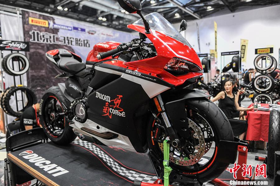 Photo taken on July 28- 29, 2018 shows a motorcycle exhibition held at the China National Convention Center in Beijing. Organized by an online auto platform, the fair displayed hundreds of motorcycles from home and abroad, such as the Ducati 959 sport bike, vintage Changjiang 650 sidecar, the Harley-Davidson WLA produced to the U.S. Army during the World War II and Benelli Leoncino bike. (Photo: China News Service/Fu Yu)