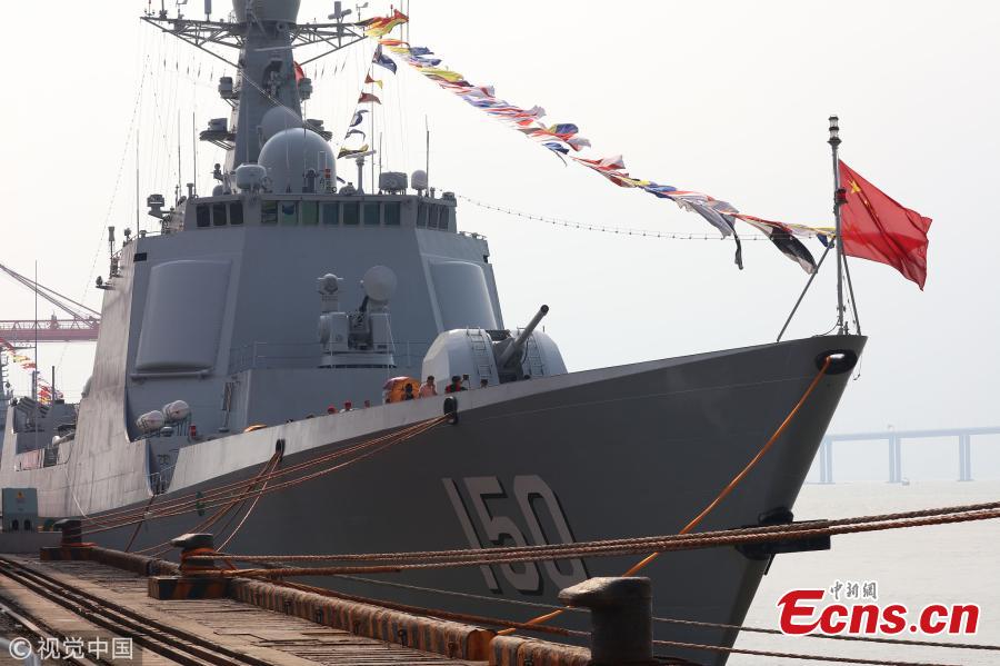 People visit the missile destroyer Changchun of the PLA Navy in Quanzhou, Fujian Province, July 30, 2018, as the \