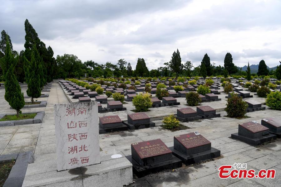 Niu Bentong, 62, works at a martyrs cemetery in Longzhou County, South China’s Guangxi Zhuang Autonomous Region, July 30, 2018. Niu participated in the China-Vietnam war and witnessed the death of many of his comrades-in-arms in front of him. In 1980, Niu chose to work in the cemetery, where 1,902 martyrs lie, and he continued to work there for 37 years until his retirement this year. He has helped correct information related to more than 400 martyrs and has also shared details online. In his spare time, Niu continues to help at the cemetery, saying it’s hard to forget the days of life and death spent alongside his fellow soldiers. (Photo: China News Service/Yu Jing)