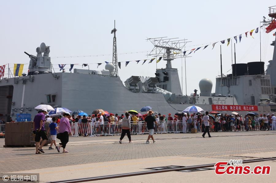 People visit the missile destroyer Changchun of the PLA Navy in Quanzhou, Fujian Province, July 30, 2018, as the \