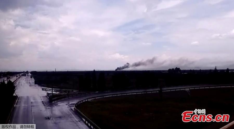 Smoke billows above a site where an Aeromexico-operated Embraer passenger jet crashed in Mexico\'s northern state of Durango, July 31, 2018, in this still image taken from a video. (Photo/Agencies)