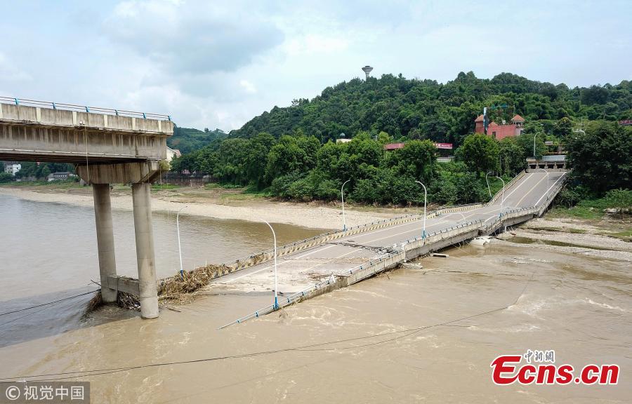 The Mingjiang River First Bridge collapses in Meishan City, Southwest China’s Sichuan Province, July 27, 2018. The bridge collapsed 28 minutes after police stopped traffic from crossing it. The bridge opened to traffic in May 1994. No one was injured in the incident. (Photo/VCG)
