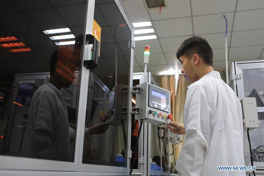 A staff member works at the Guizhou Space Appliance Co. Ltd in Guiyang, capital of southwest China\'s Guizhou Province, Aug. 1, 2018. Guizhou has become a pioneer in China\'s big data development. Big data is being widely applied in government management, business and daily life, contributing over 20 percent to the economic growth of Guizhou Province. The number of big data-related companies in Guizhou Province has grown from less than 1,000 in 2013 to more than 8,500 in 2018.(Xinhua/Ou Dongqu)