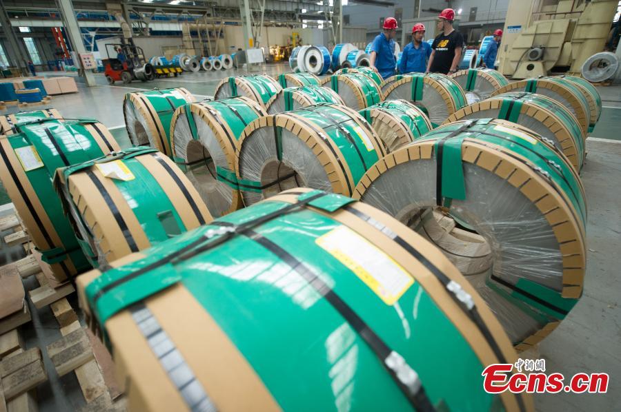 The production line of 0.022-millimeter-thick stainless steel at in a company in Taiyuan City, the capital of North China’s Shanxi Province, Aug. 8, 2018. The company started mass production of the advanced 0.02-millimeter-thick, 600-millimeter-wide stainless steel, which is said to have wide applications in a range of fields, including aerospace, automotive, electronics and computers. Sources said due to difficult production techniques, China used to import the product from Japan and Germany. (Photo: China News Service/Wei Liang)