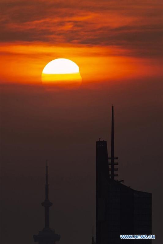 Photo taken on Aug. 11, 2018 shows the sun going through a partial solar eclipse in Nanjing, capital of east China\'s Jiangsu Province. (Xinhua/Su Yang)