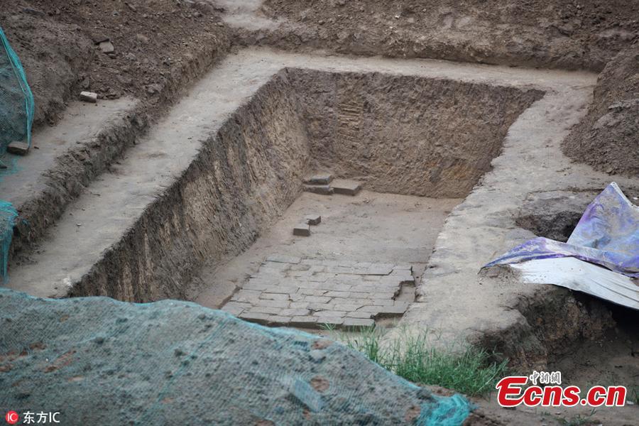 Ancient tomb clusters consisting of about 300 tombs have been found near the Beijing Olympic Sports Center in Beijing, China. The 300 tombs, discovered at a construction site, were presumably built around the Qing Dynasty (1644-1911), according to local cultural relics department. (Photo/IC)
