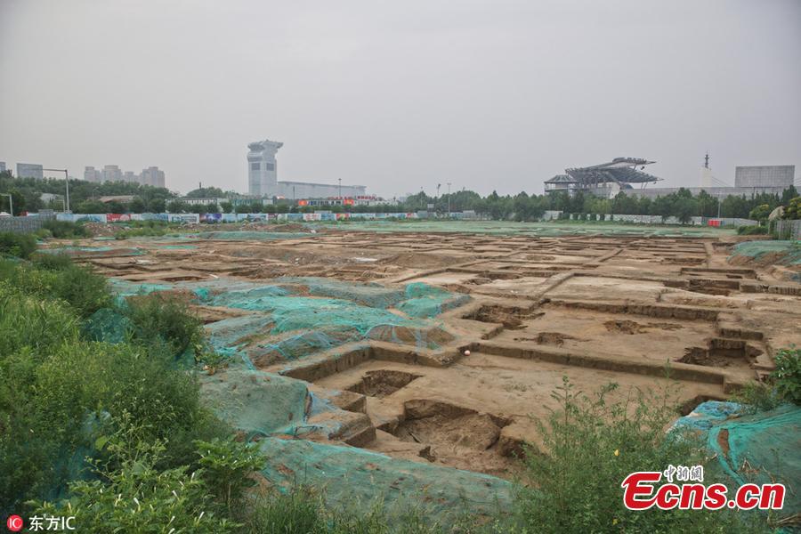 Ancient tomb clusters consisting of about 300 tombs have been found near the Beijing Olympic Sports Center in Beijing, China. The 300 tombs, discovered at a construction site, were presumably built around the Qing Dynasty (1644-1911), according to local cultural relics department. (Photo/IC)