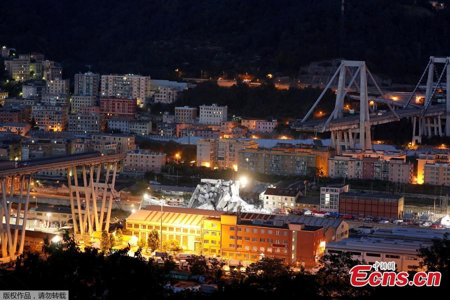 A general view of the collapsed Morandi Bridge in the port city of Genoa, Italy August 14, 2018. The bridge connects the highway A10 to the western part of the city, near a populous neighborhood called Sampierdarena. At least 26 people were killed in the accident. (Photo/Agencies)